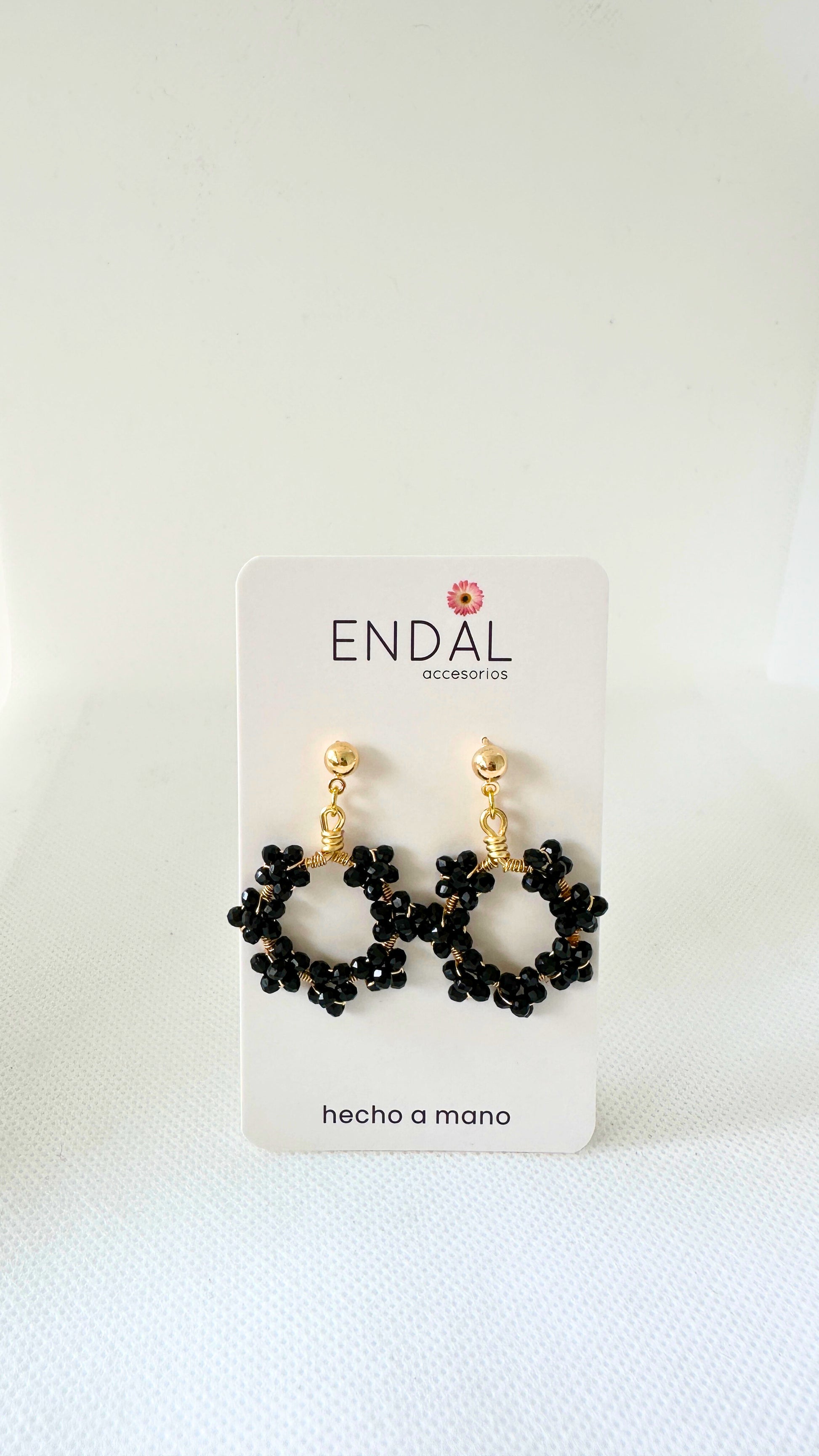 Aretes Nina Negro con dorado