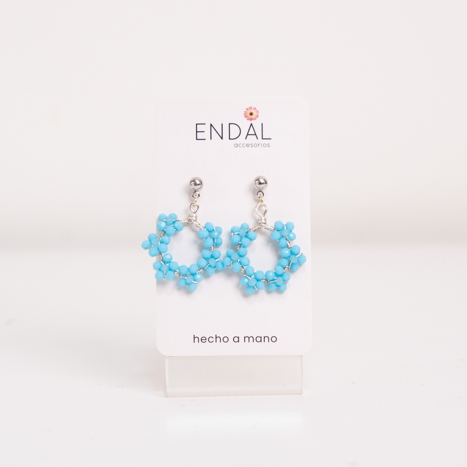 Aretes Nina celeste con plateado