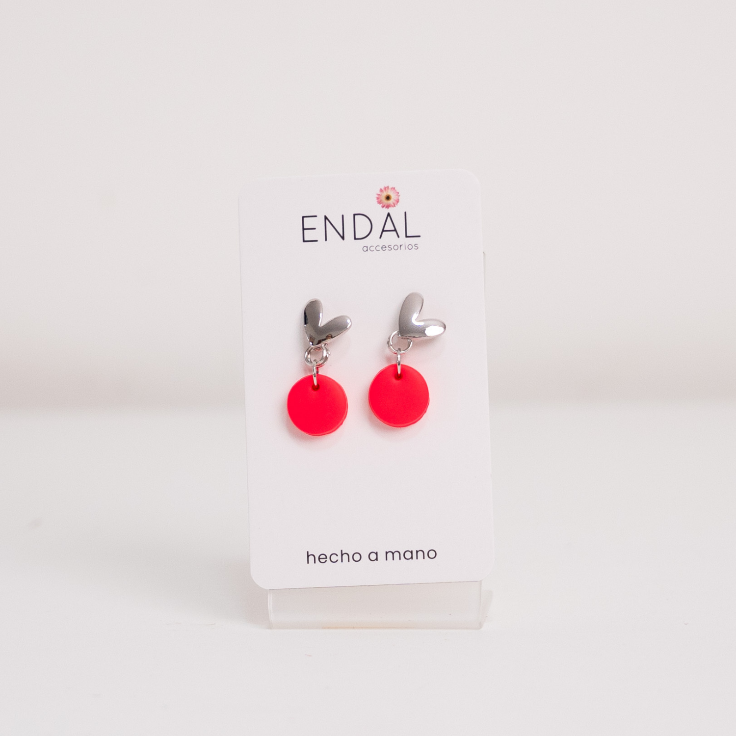 Aretes Caye fuxia